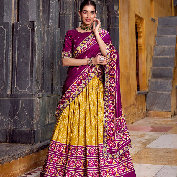Mustard Color Ikkat Patola Printed Tasar Silk Lehenga Choli