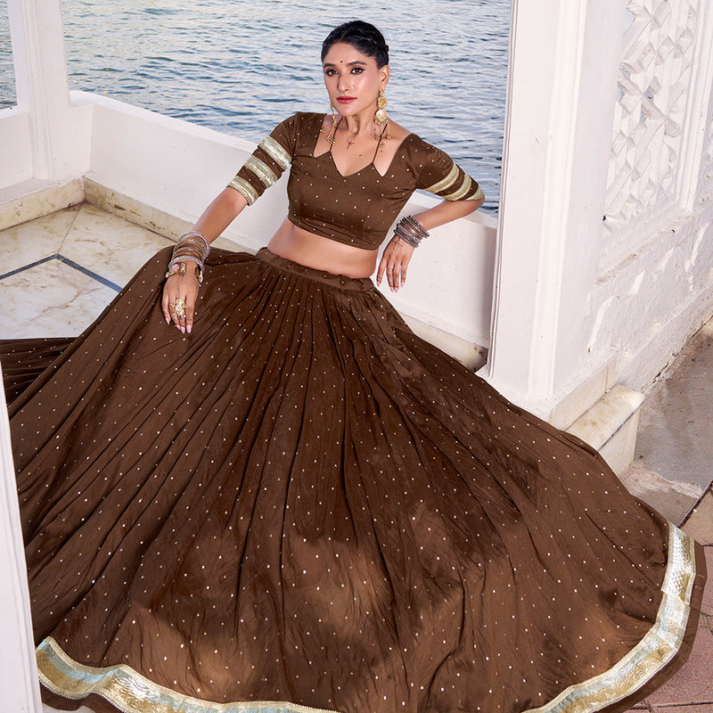 Brown Color Zari Weaving Work With Embossed Design Chanderi Lehenga Choli
