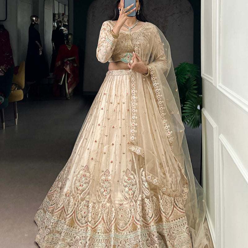 Cream Color Sequins And Thread Embroidery Work Net Lehenga Choli