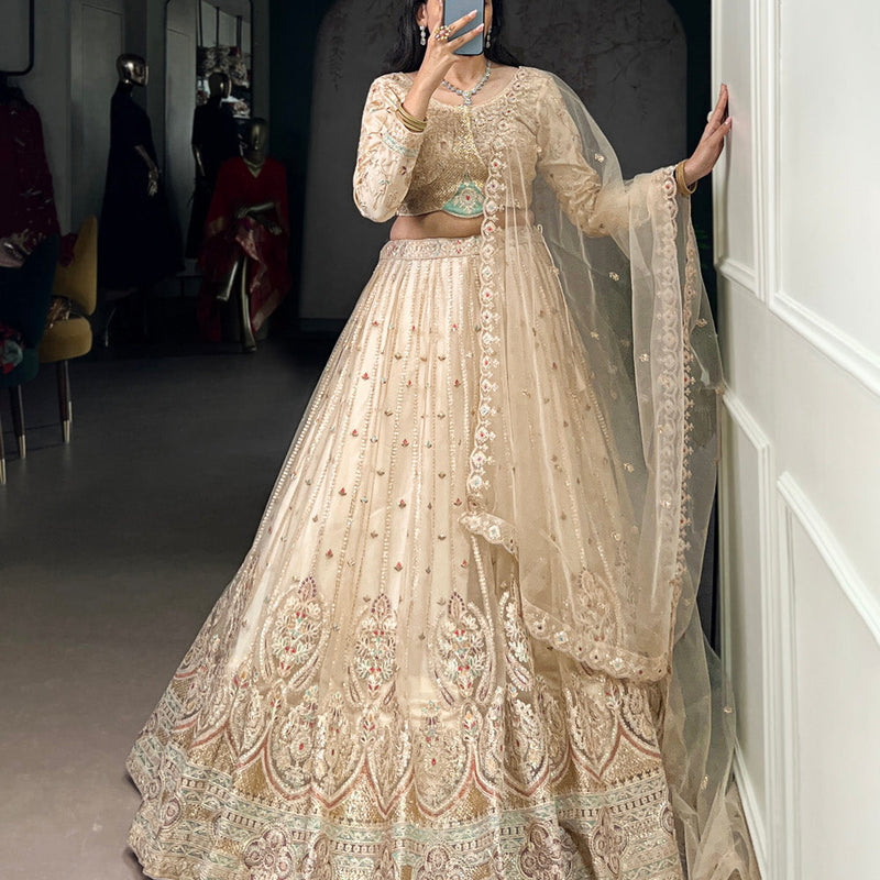 Cream Color Sequins And Thread Embroidery Work Net Lehenga Choli