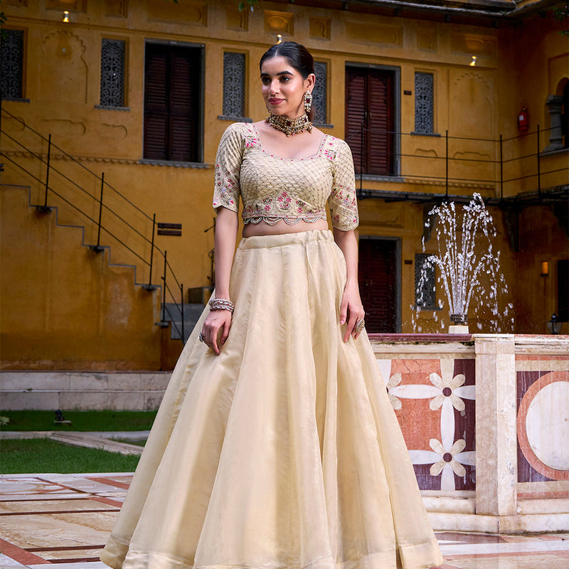 Cream Color Sequince And Thread Embroidery Work Raspberry Lehenga Choli